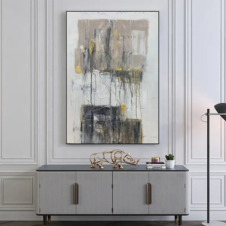 An abstract painting hanging above a sideboard, adding a vibrant touch to the room's decor.