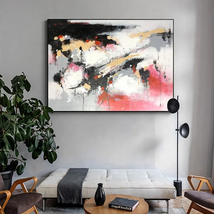 Abstract painting on living room wall. Vibrant colors and bold brushstrokes create a captivating visual experience.