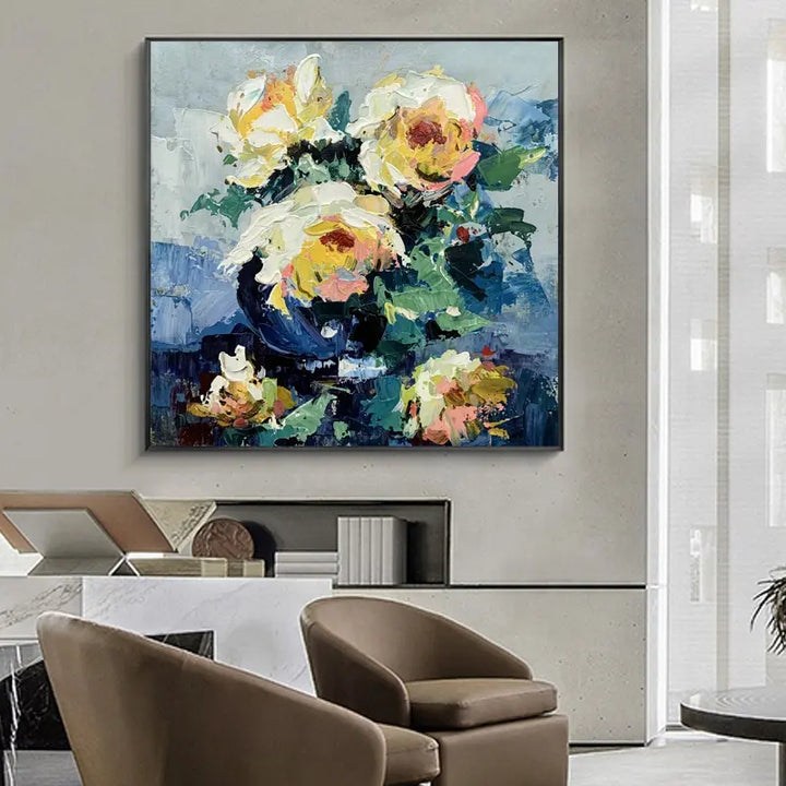 A still life painting of vibrant yellow roses arranged in a vase, showcasing the beauty of nature.