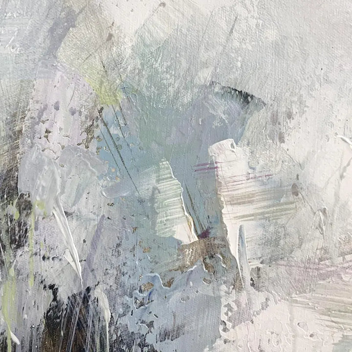 An abstract painting featuring white and gray paint, showcasing an intriguing blend of shades and shapes.