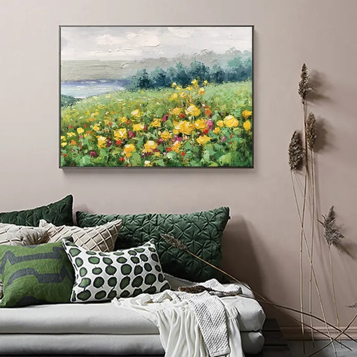 A vibrant painting of yellow flowers adorning a wall, adding a touch of color and beauty to the surroundings.