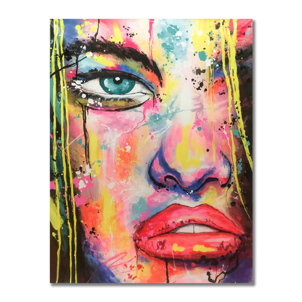 A vibrant painting of a woman's face adorned with colorful paint splatters, creating a captivating and expressive artwork.