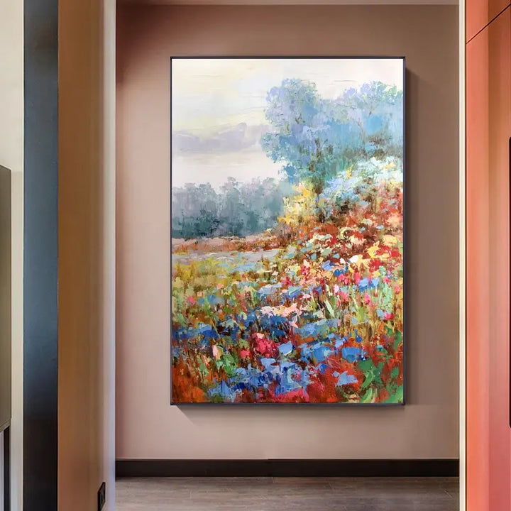 A vibrant field of flowers adorns a modern living room in this colorful painting.