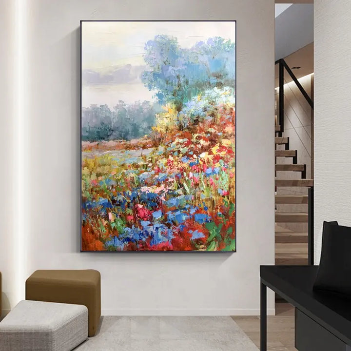 A lively and vibrant scene is created by an abstract painting depicting colorful flowers blooming in a vast field.