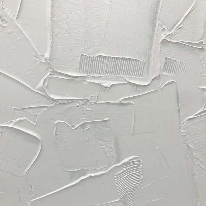 An abstract painting featuring white paint strokes, creating a unique and artistic composition.