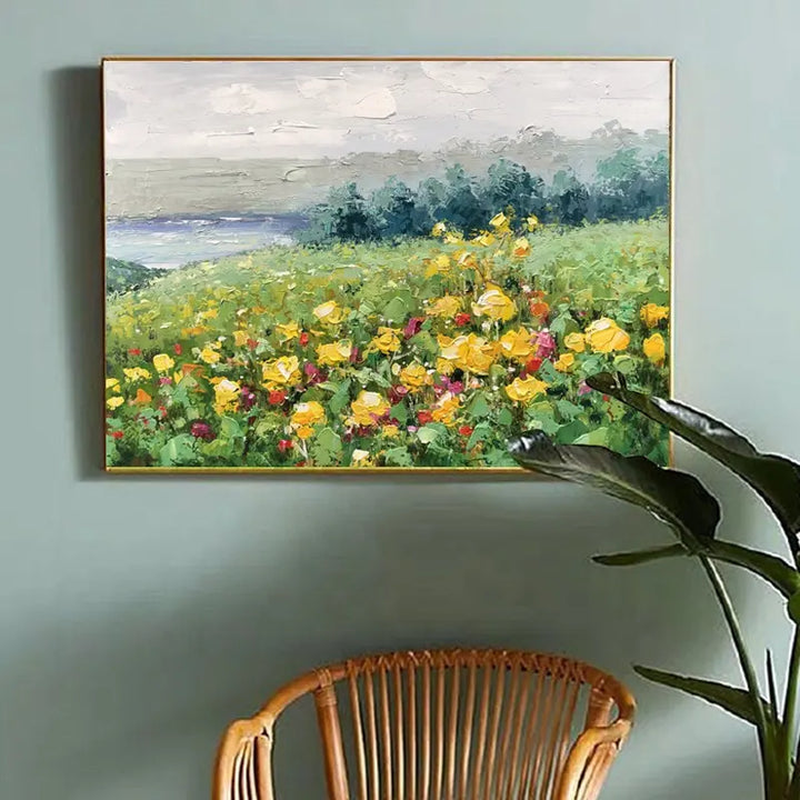 A vibrant painting of yellow flowers adorning a wall in a room, adding a touch of color and nature to the space.