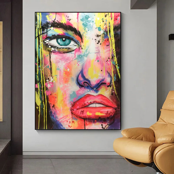 A vibrant painting capturing the essence of a woman's face with a burst of colors.