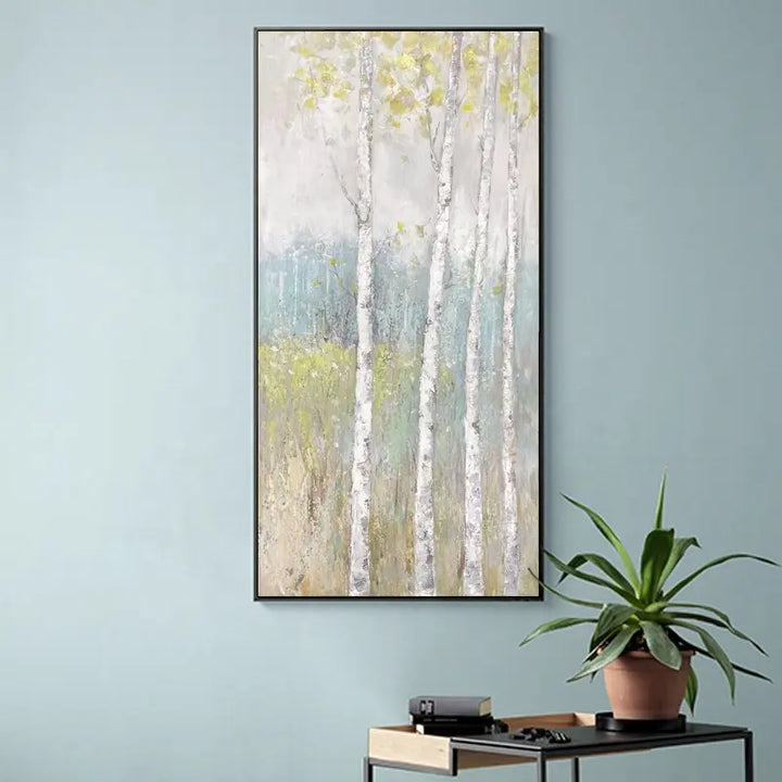 A painting of birch trees on a wall, showcasing the elegant white trunks and delicate leaves.