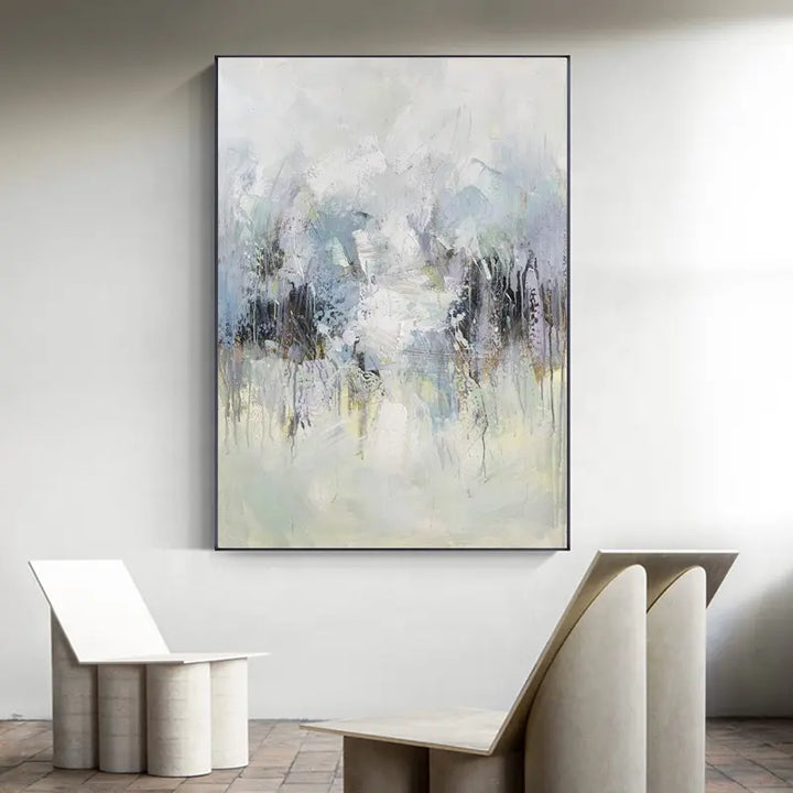 An abstract painting adorns a living room, adding a touch of artistic flair to the space.