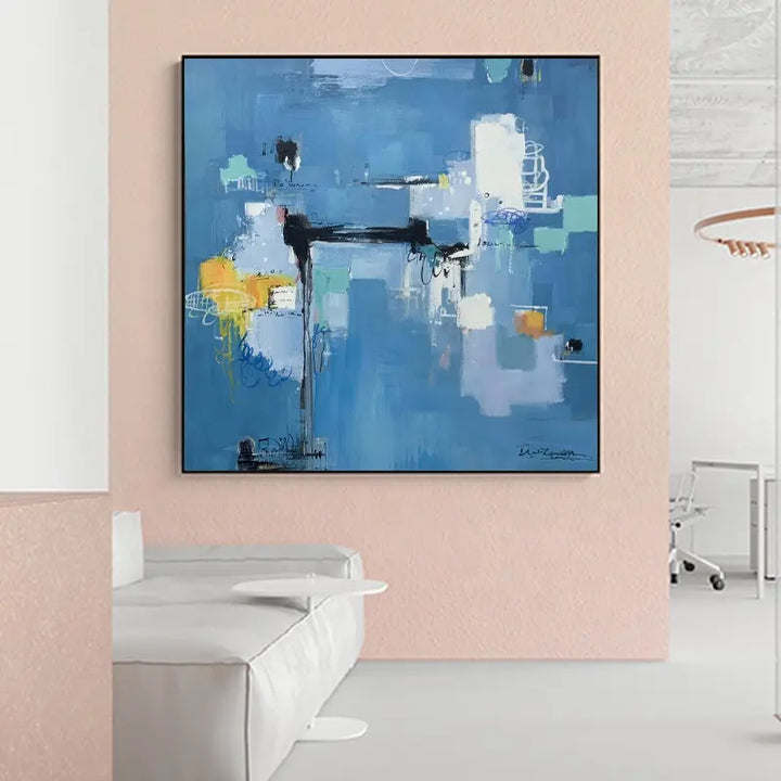 An abstract painting hanging in a modern office, adding color and artistic flair to the professional environment.