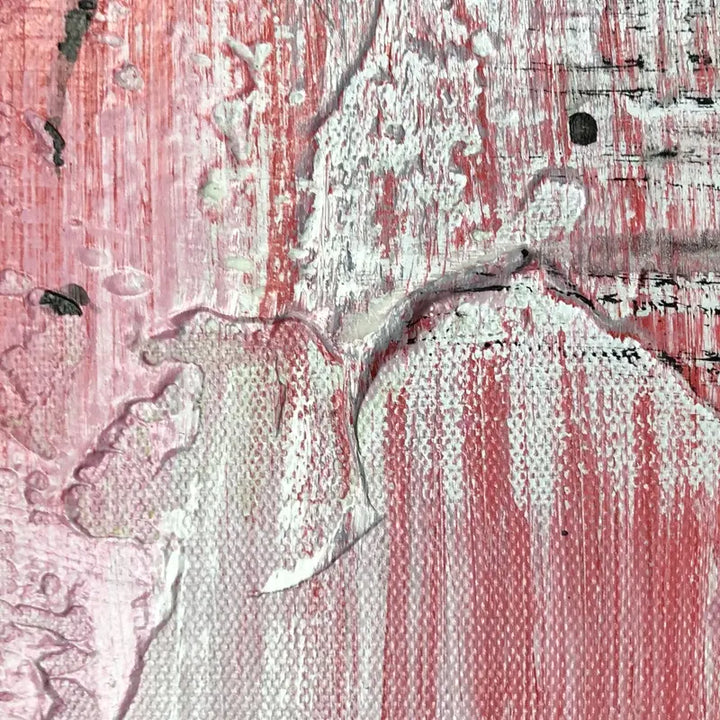 A close-up of a painting featuring vibrant red paint, showcasing intricate brushstrokes and rich textures.