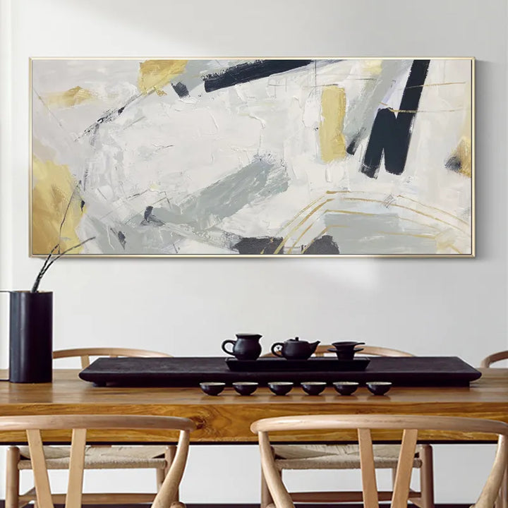 A vibrant abstract painting adorns the wall above a dining table, adding a touch of artistic flair to the space.